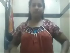Mature tamil bhabhi getting naked teasing her devar